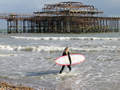 Surfer and pier, Brighton