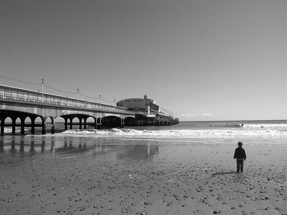 Boy and pier, Bournemouth
