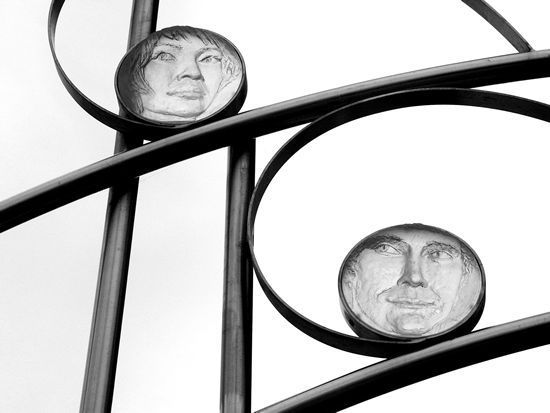 Round faces, Lloyd George Avenue, Cardiff