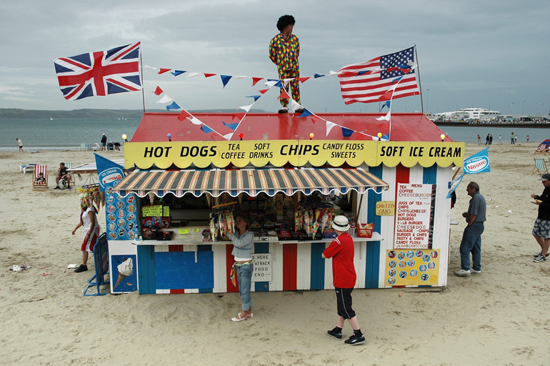 Beach scene with flags, Weymouth